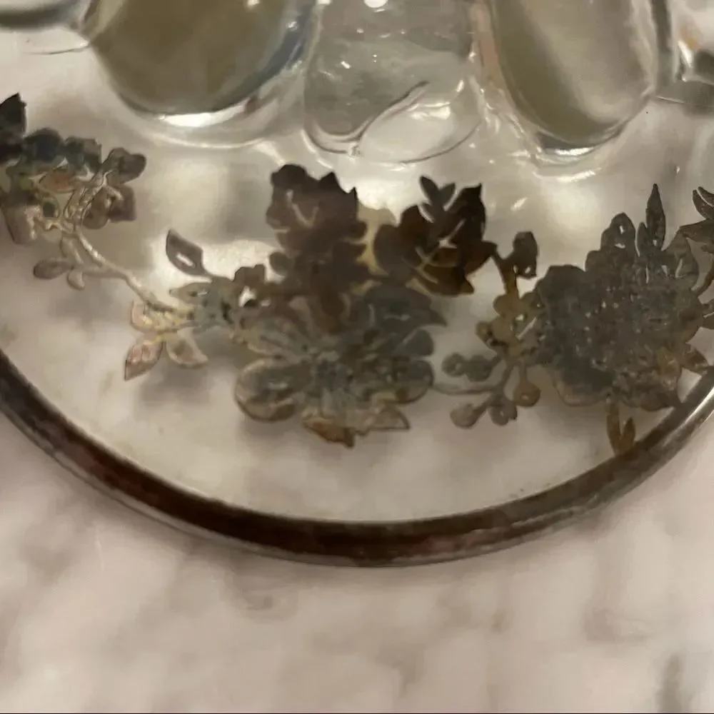 Pair of Circle Silver Overlay Floral Candesticks